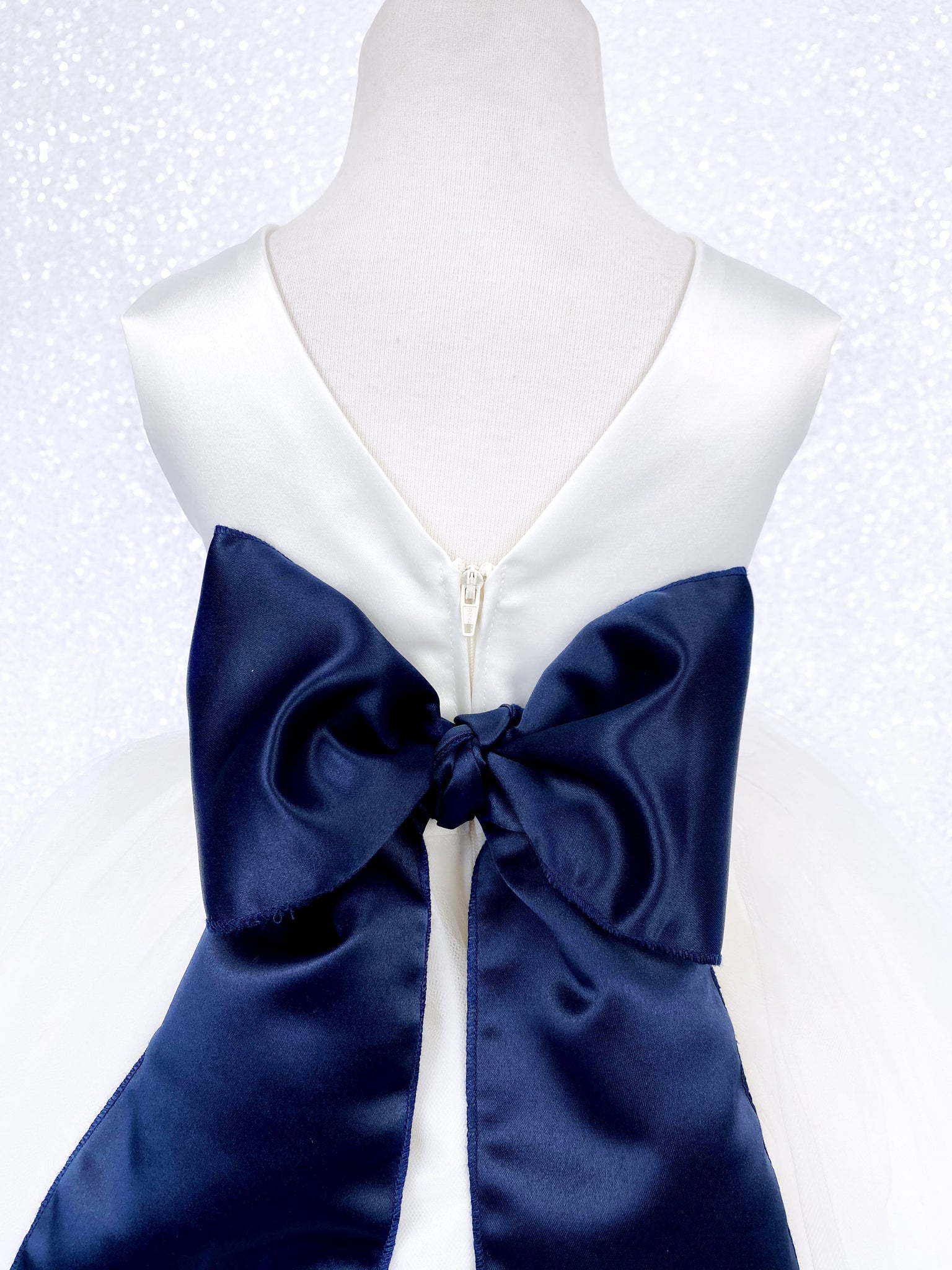 Sleeveless V-Back Carnation FL Ivory 2 Layer Tulle Dress Navy Blue Sash Flower