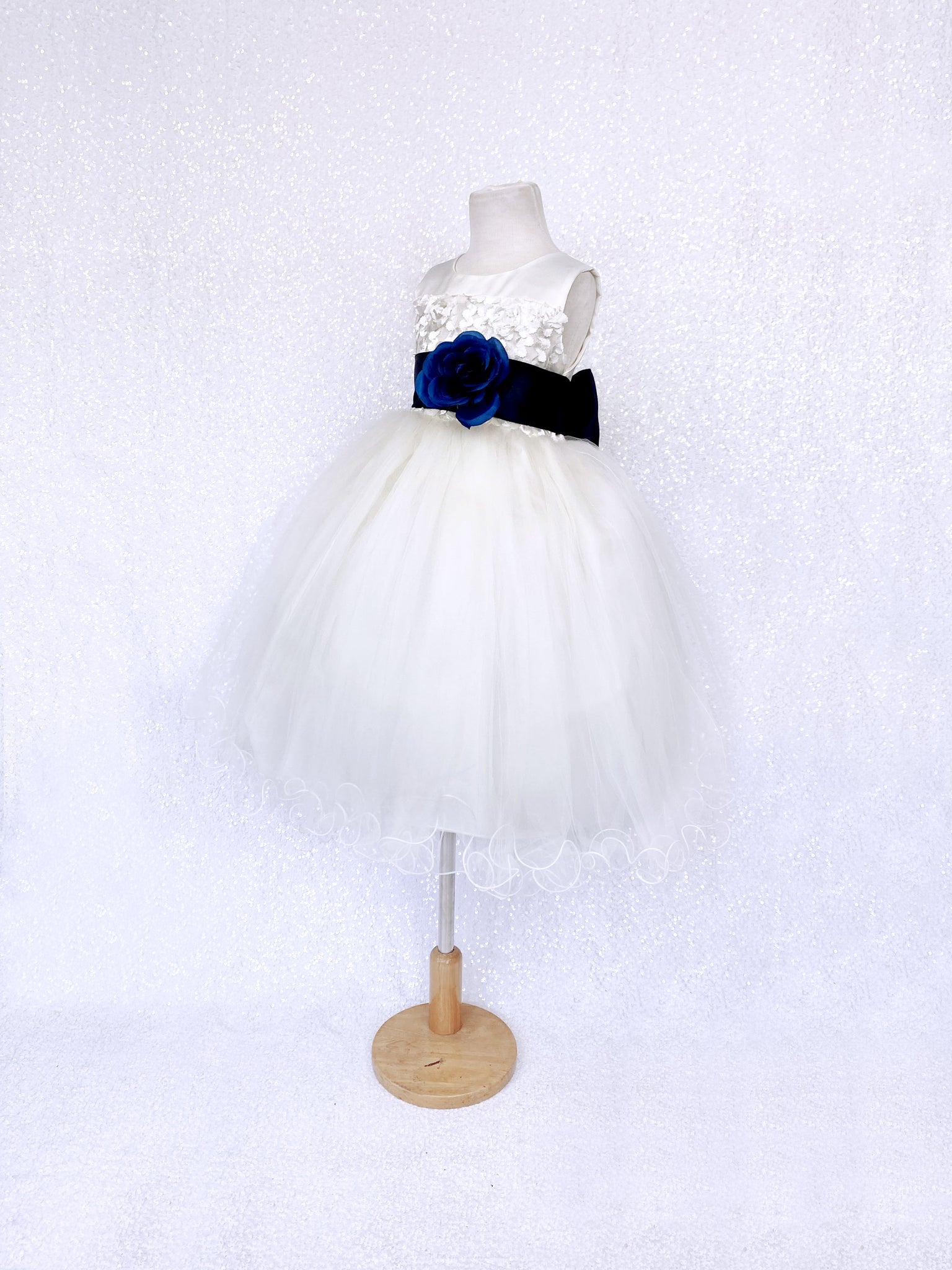 Sleeveless V-Back Carnation FL Ivory 2 Layer Tulle Dress Navy Blue Sash Flower
